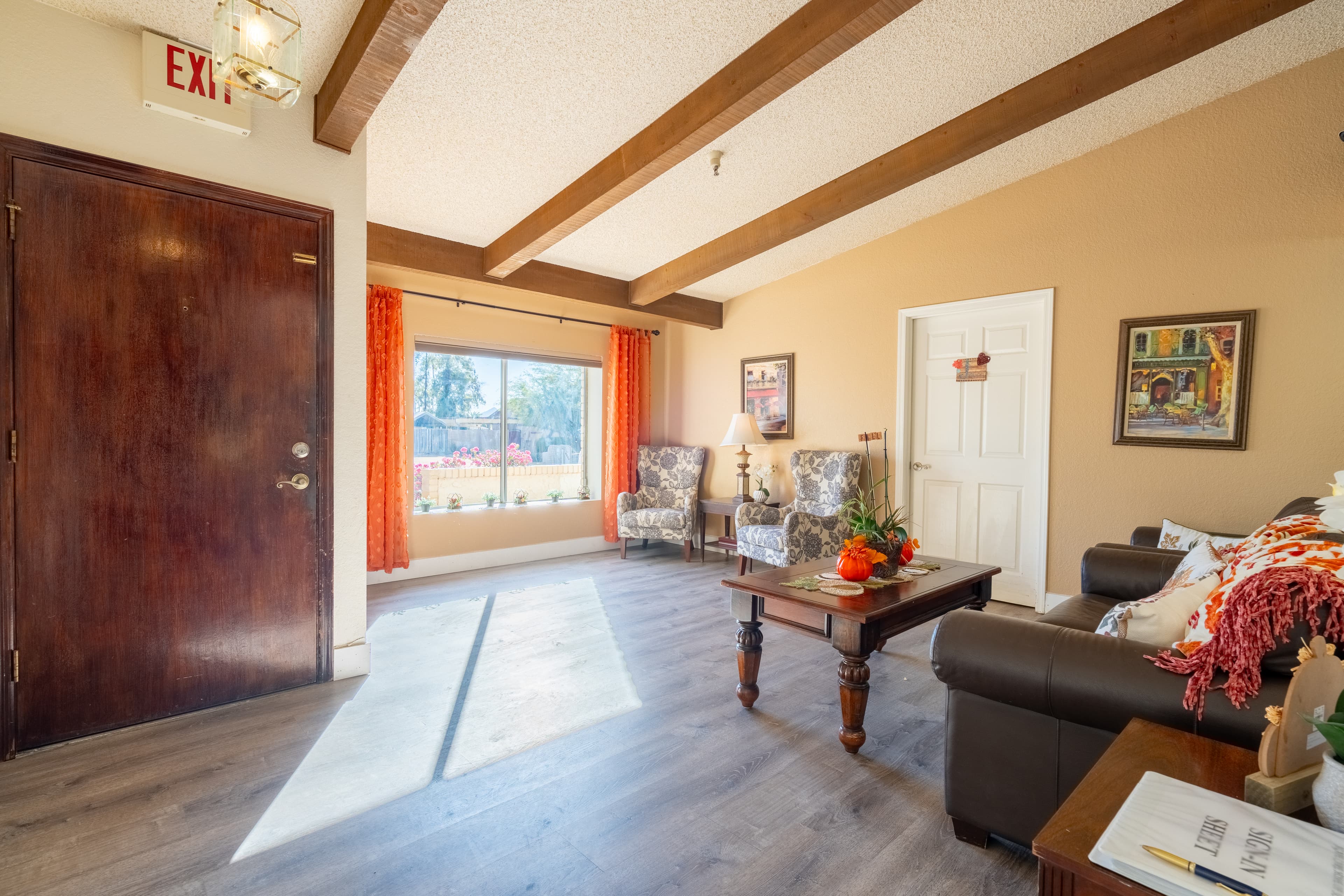 Open kitchen and dining area with brick fireplace